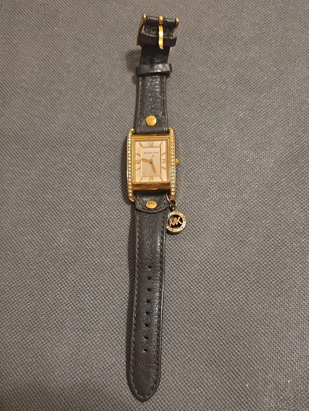Michael Kors Black Leather Strap Gold-Tone Rectangular Watch with MK Charm